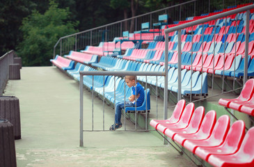 little boy at stadium
