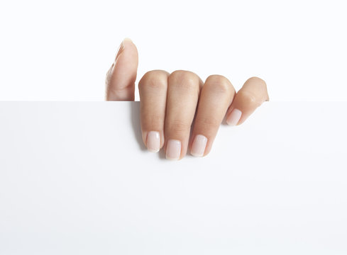 Hand h&auml;lt Schild