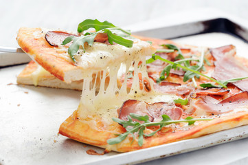 Gourmet rustic pizza lifted