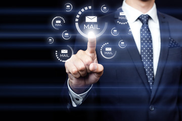 Businessman clicking on email icon