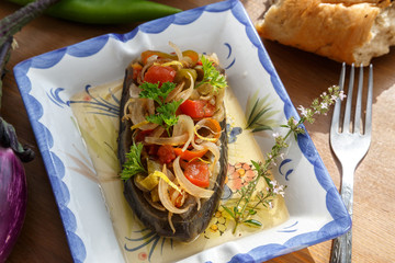 Turkish dish Imam bayildi on white plate