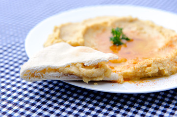 Eating humus, middle eastern cuisine