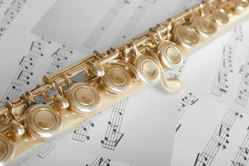 Obraz premium Flute on music notes background