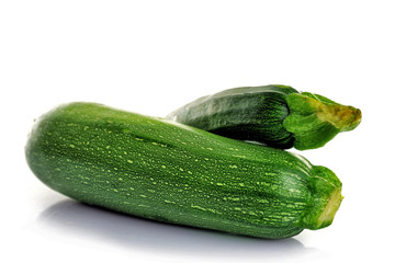 Fresh zucchini isolated on white
