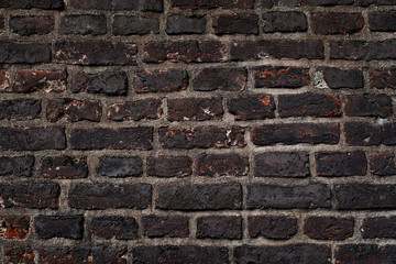 Dark grunge brick wall