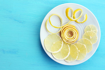 Ripe lemons on wooden table close up