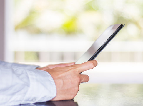 Man with digital tablet