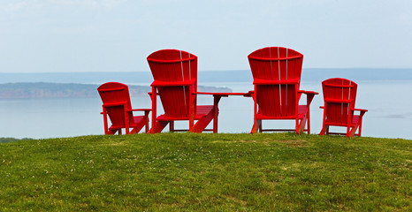 Four Red Adirondack Chairs