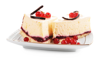Tasty pieces of cheesecake with berries isolated on white