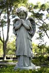 Praying angel statue