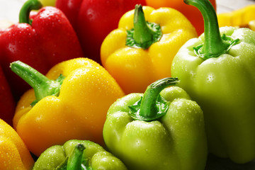 Group of wet colorful peppers, closeup