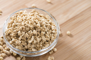 Wooden background with Soy Meat