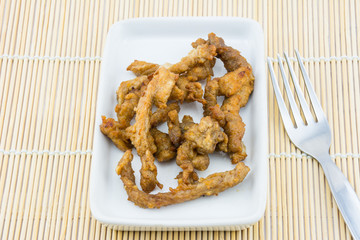Fried pork and fork