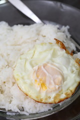 rice and fried eggs of easy breakfast cooking