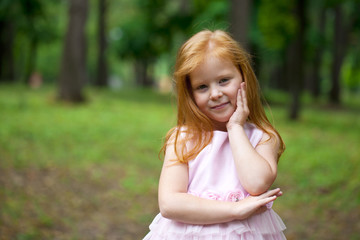 Close up, portrait of little redheaded girl