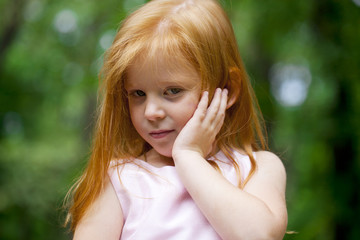 Close up, portrait of little redheaded girl