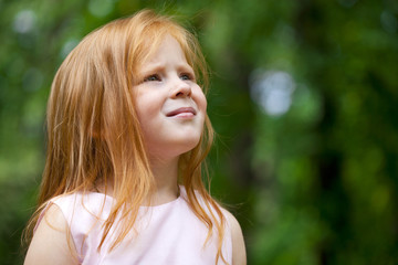 Naklejka premium Close up, portrait of little redheaded girl