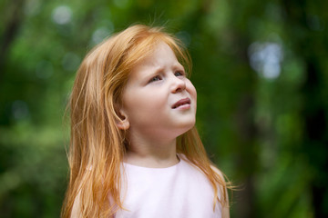 Fototapeta premium Close up, portrait of little redheaded girl