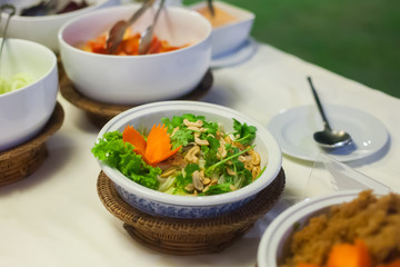 Spicy fish in a bowl set for wedding dinner party