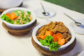 Spicy fish in a bowl set for wedding dinner party