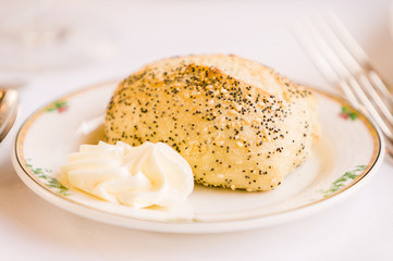 Closeup of small loaf of bread and butter