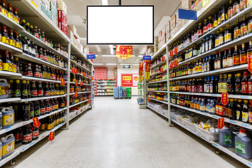 blank supermarket TV in blurry for background