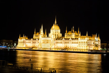 Fototapeta premium The Hungarian Parliament Building with bright and beautiful illu