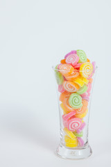 Jelly sweet, flavor fruit, candy dessert colorful in glass on wh
