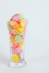 Jelly sweet, flavor fruit, candy dessert colorful in glass on wh