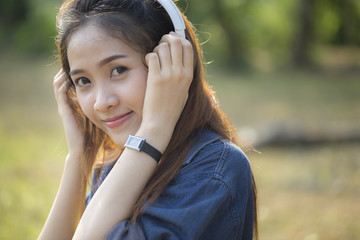 Beautiful girl listening to music.
