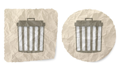 Crumpled slip of paper and a trashcan