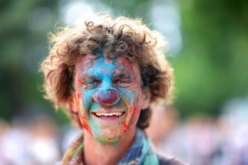 Face of a laughing clown at holi festival