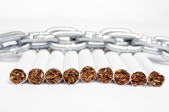 Chained cigarettes. Conceptual image. Smoking.