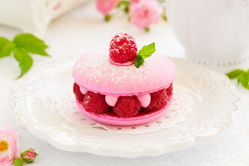 French makarons cake with raspberries.