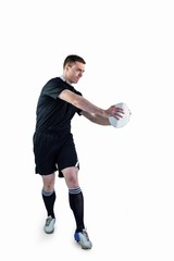 Rugby player doing a side pass