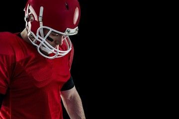 Fototapeta premium Close up view of american football player focusing