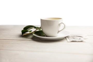 Obraz na płótnie Canvas Cup of herbal tea on table