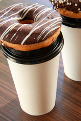 Take away coffee with donut