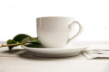 Cup of herbal tea on table