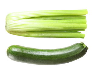 Celery and zucchini isolated on white background