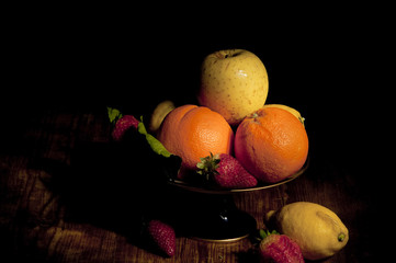 footed plate with fruit