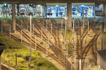 Train tracks in switch yard hongkong by night