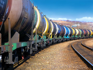 Parking train of colorful tanks