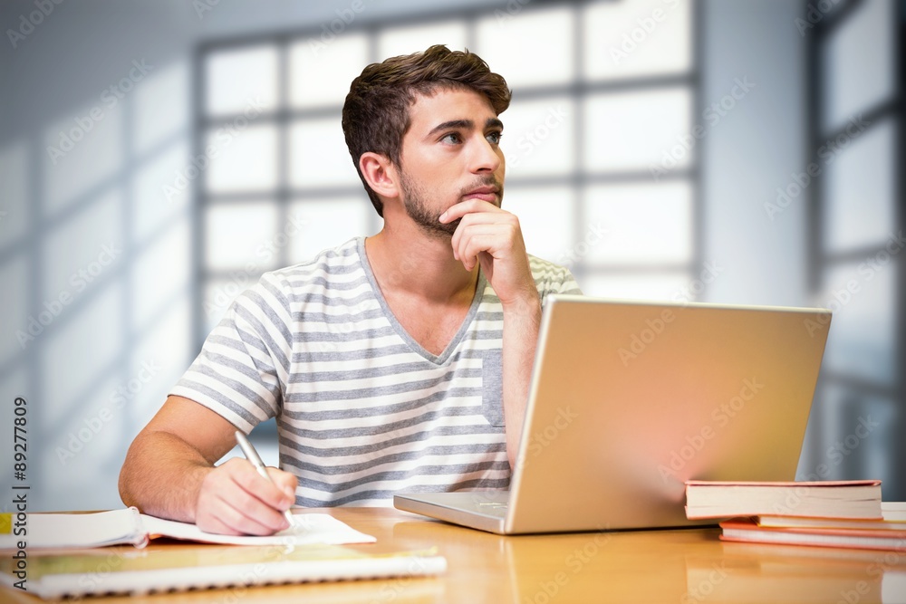 Poster composite image of student studying in the library with laptop