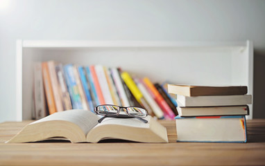 Pile of books on table