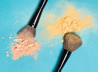 Matte compact powder and shimmer powder with makeup brushes