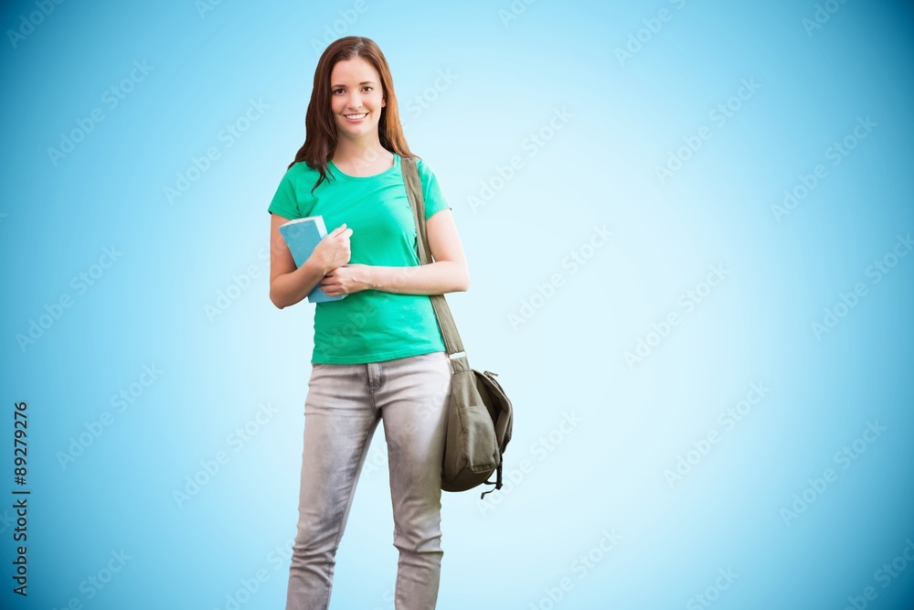 Poster Composite image of student smiling at camera in library