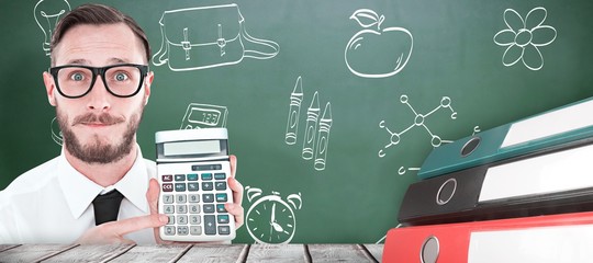 Composite image of geeky businessman pointing to calculator 