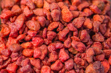 Heap of dried garden strawberries (Fragaria × ananassa) for sale