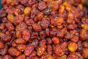 Heap of dried grape tomatoes for retail sale in Thailand food market